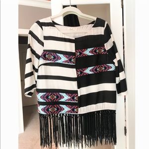 Top with silky black fringe + asymmetrical stripes